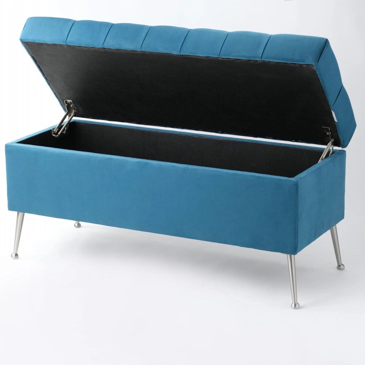 Elegante puf acolchado con contenedor en azul sobre patas delgadas