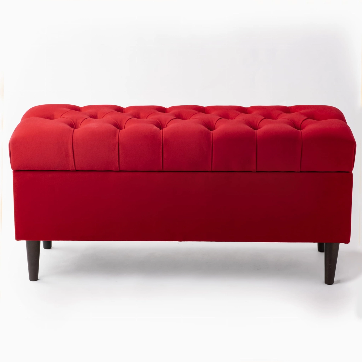 Puff acolchado con almacenaje en rojo intenso, una solución cómoda y estética