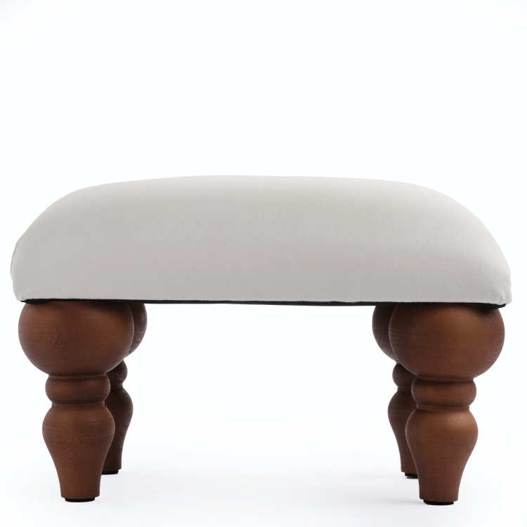 Reposapiés para sillón en color blanco, mueble práctico y estético.