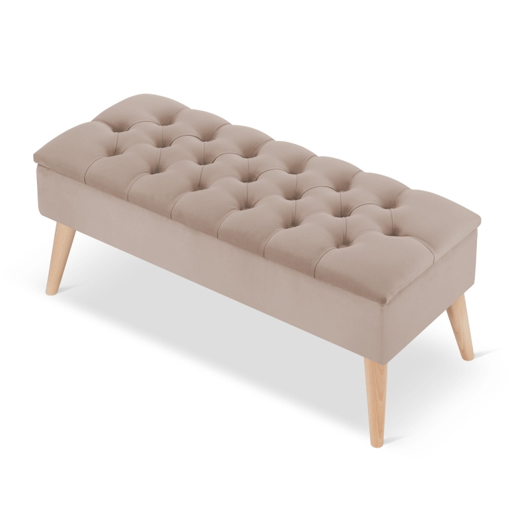 Elegante puf acolchado con leche y espacio de almacenamiento: un práctico mueble para el interior