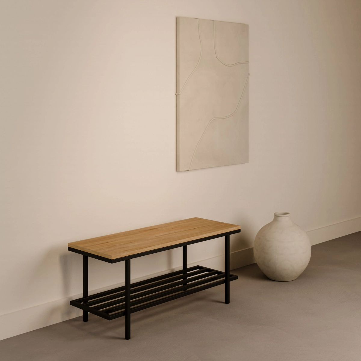 Banco con tapa de madera de estilo industrial sobre una base de acero en un pasillo