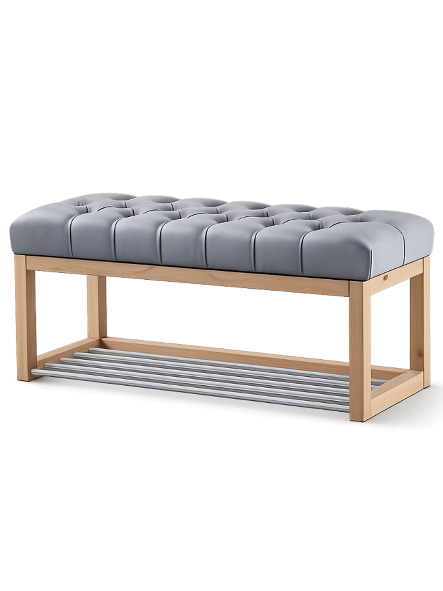 Banco acolchado gris con estructura de madera clara y un estante.