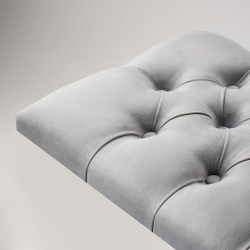 Panel de pared gris acolchado