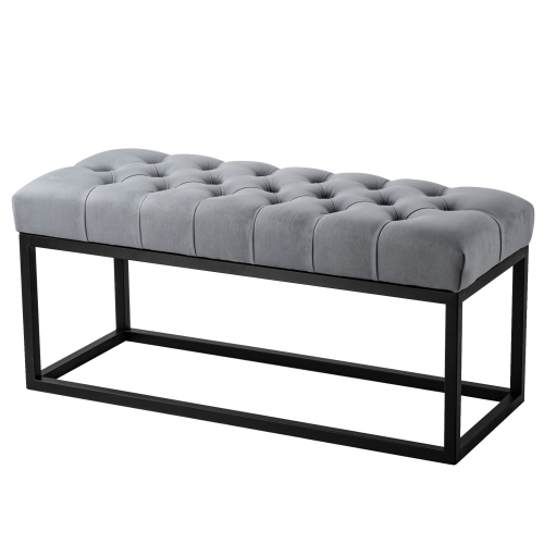 Banco acolchado en color gris sobre patas de metal