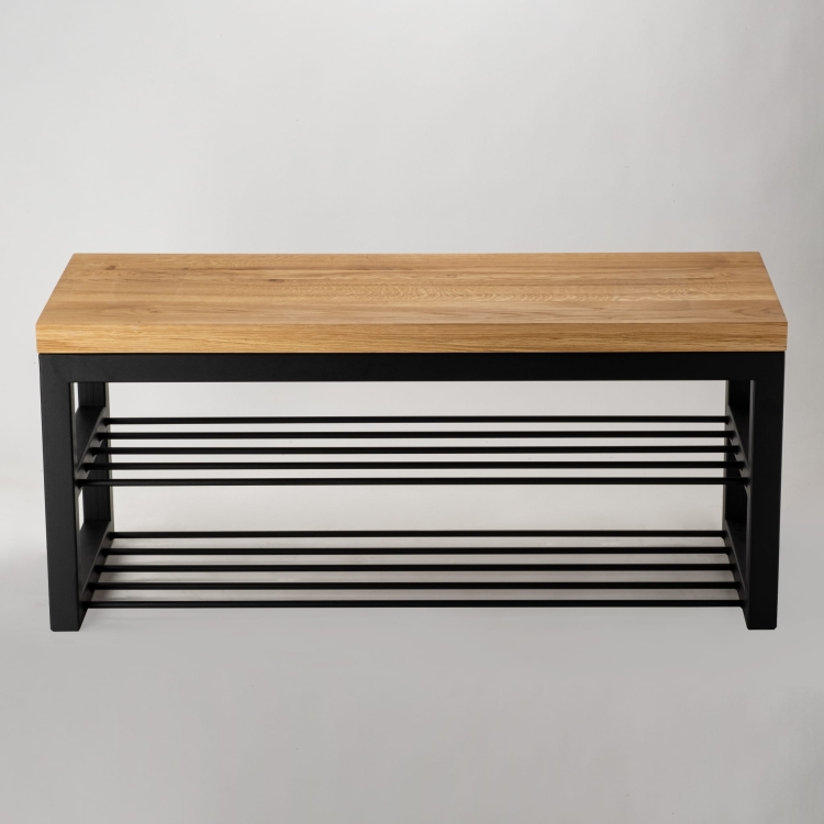 Un banco con tapa de madera y base de acero de estilo loft