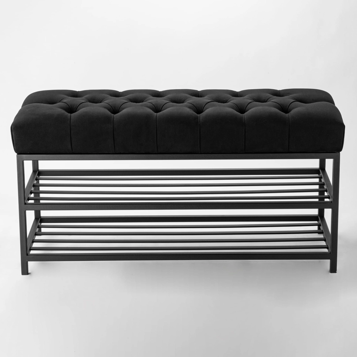 Banco de metal negro, perfecto para el pasillo